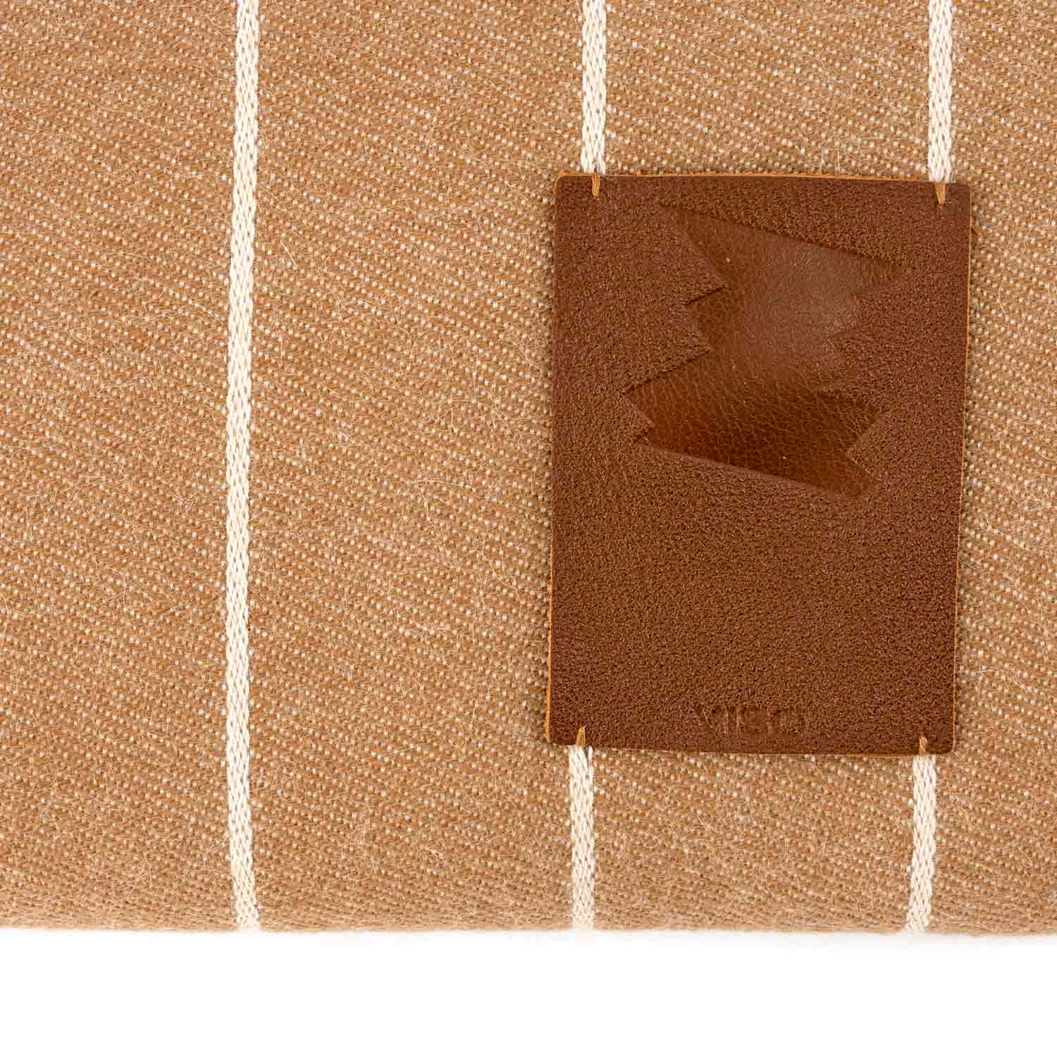 Close-up of the leather label on a blanket