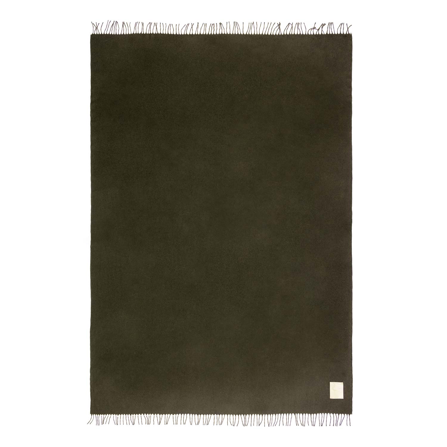 A dark green cashmere blanket with fringes, laid flat with a brand tag visible.