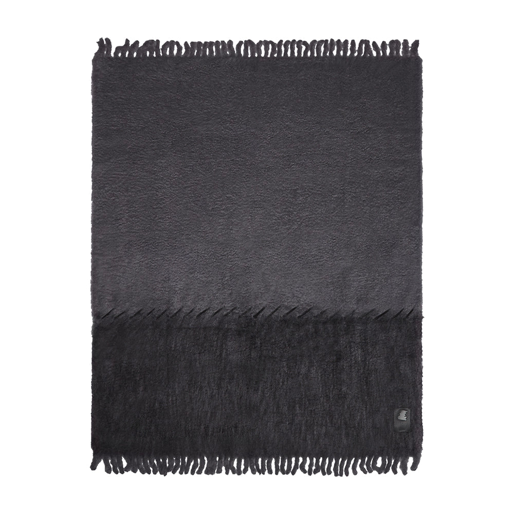 Gradient gray throw mohair blanket with fringes on a white background