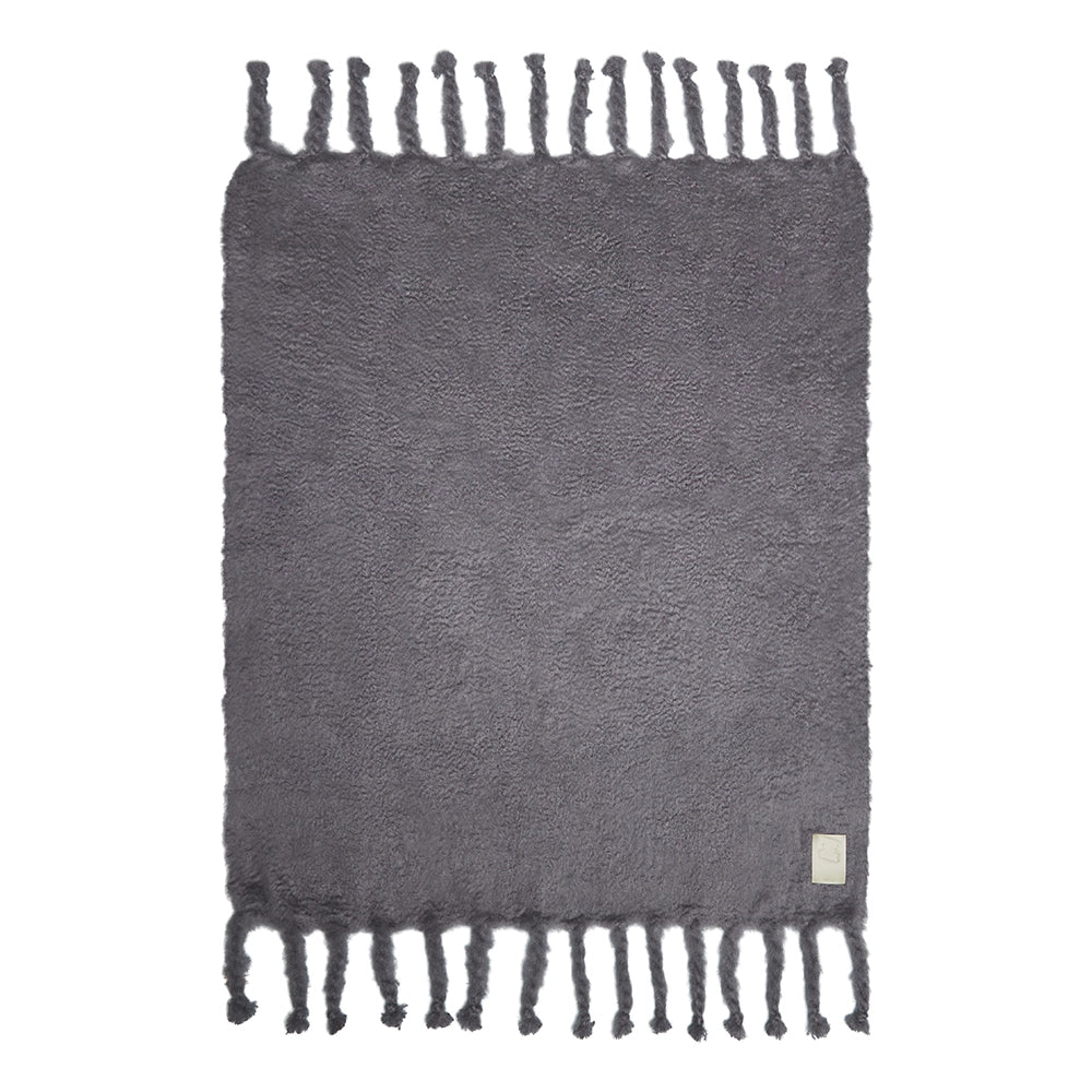 Gray woven blanket with fringes on a white background