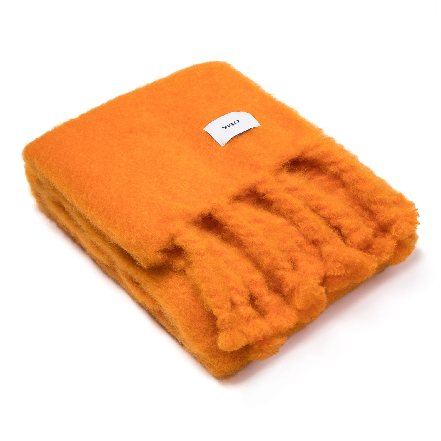A bright orange mohair blanket with textured fringes displayed on a white background.
