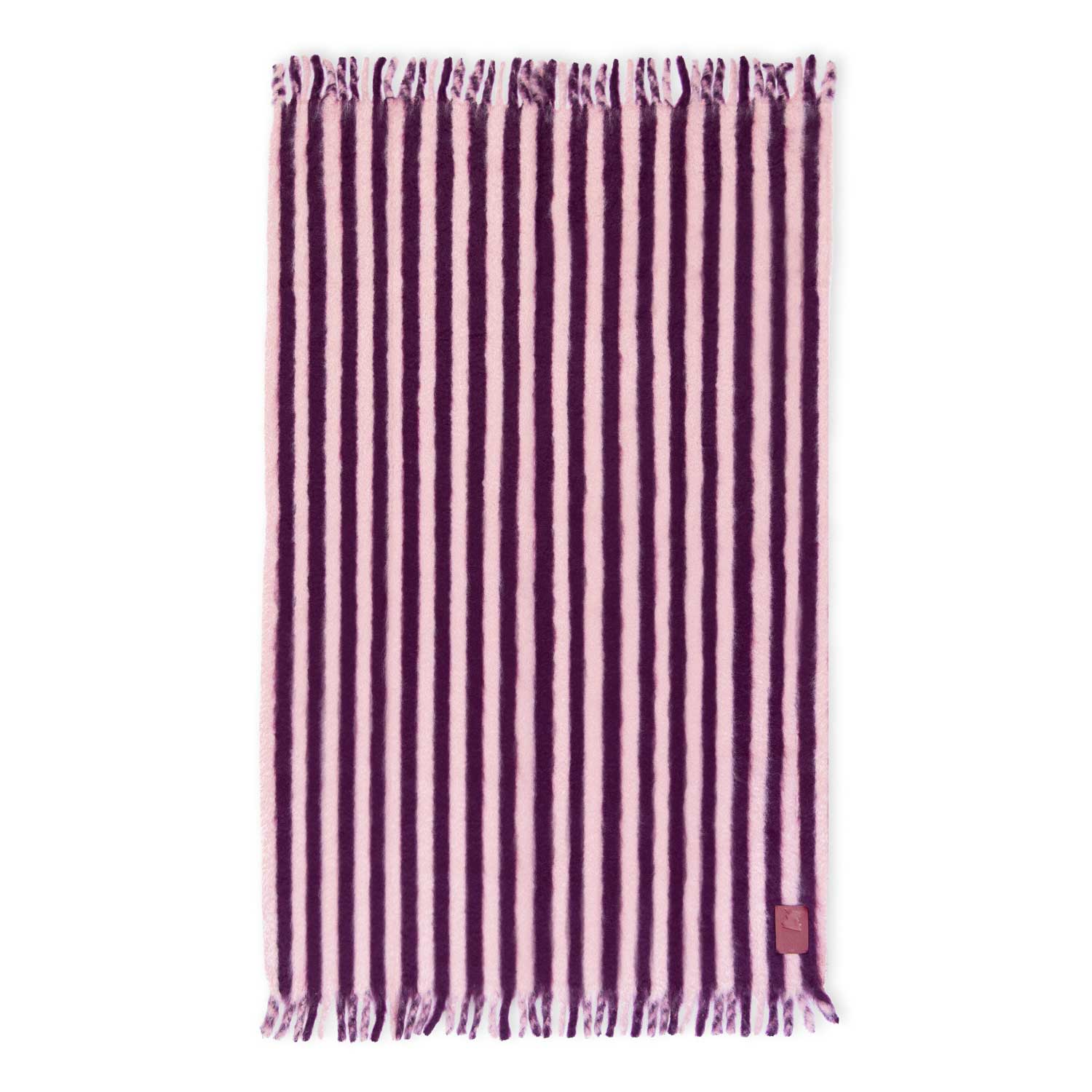 Flat mohair blanket with purple and pink stripes, featuring a fringe and a green leather label on one corner.