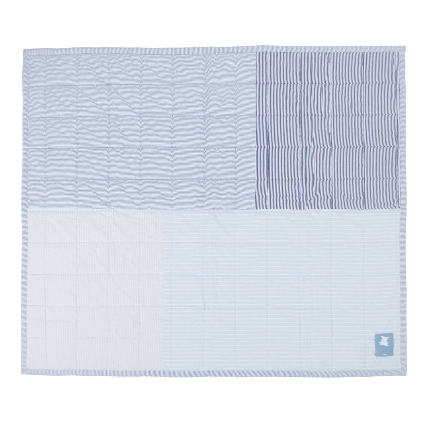 Quilt with a patchwork design on a white background