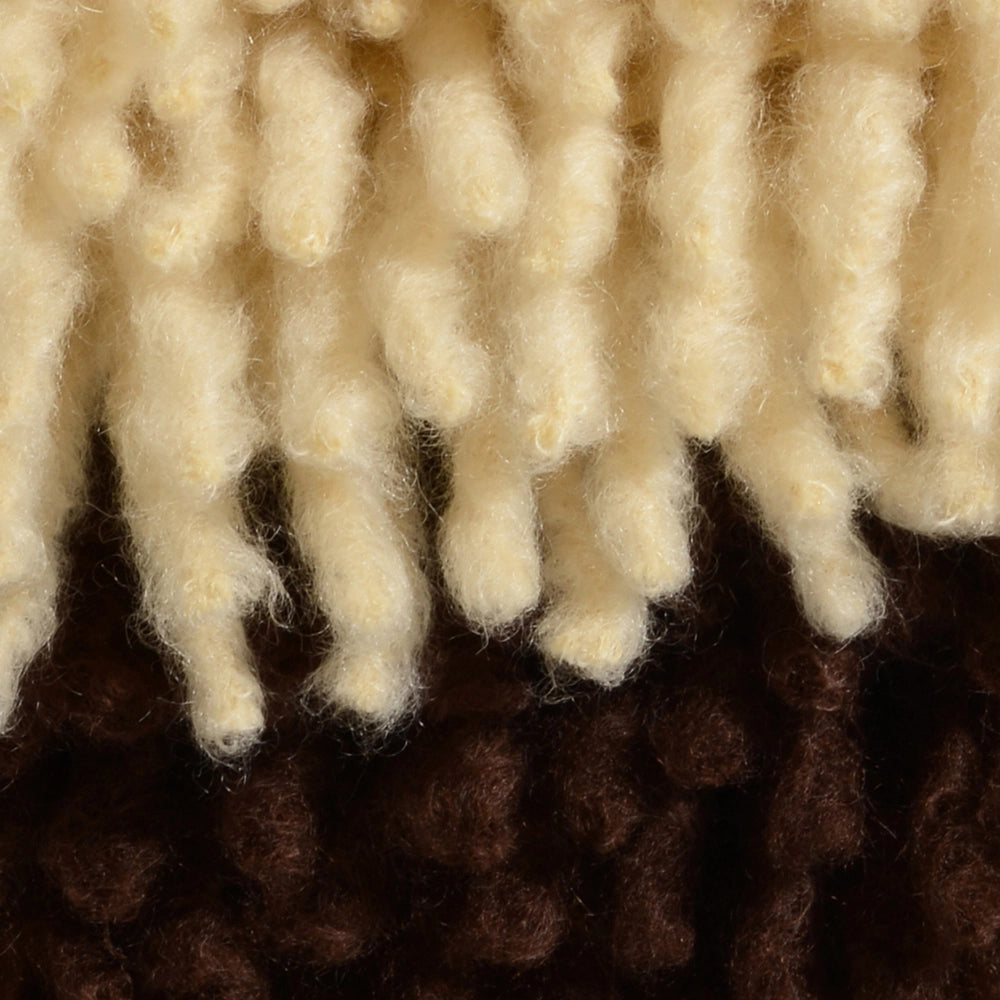 Close-up of textured mohair fabric blankets with cream and chocolate colors – Ready to Hang X Viso