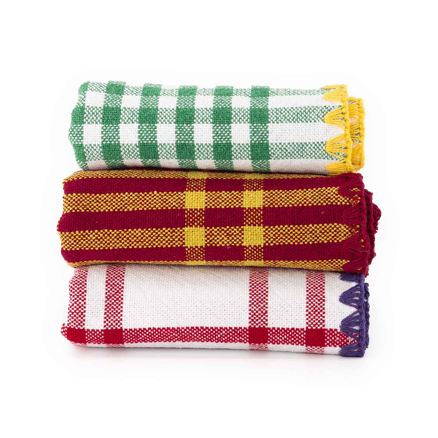 Three check jacquard napkins in different colors, folded and stacked.