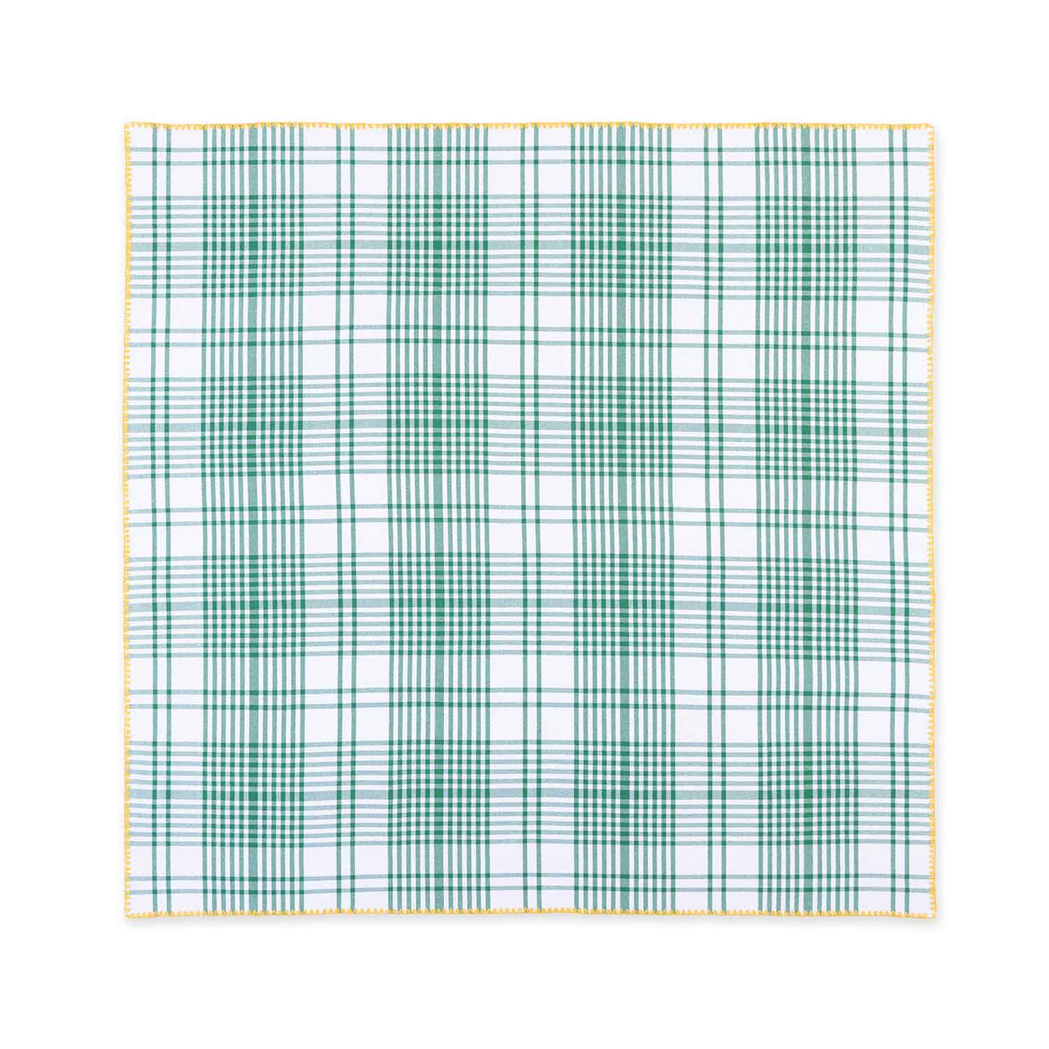 A folded green, white, and yellow checkered tablecloth with contrasting detail stitching and a yellow napkin.