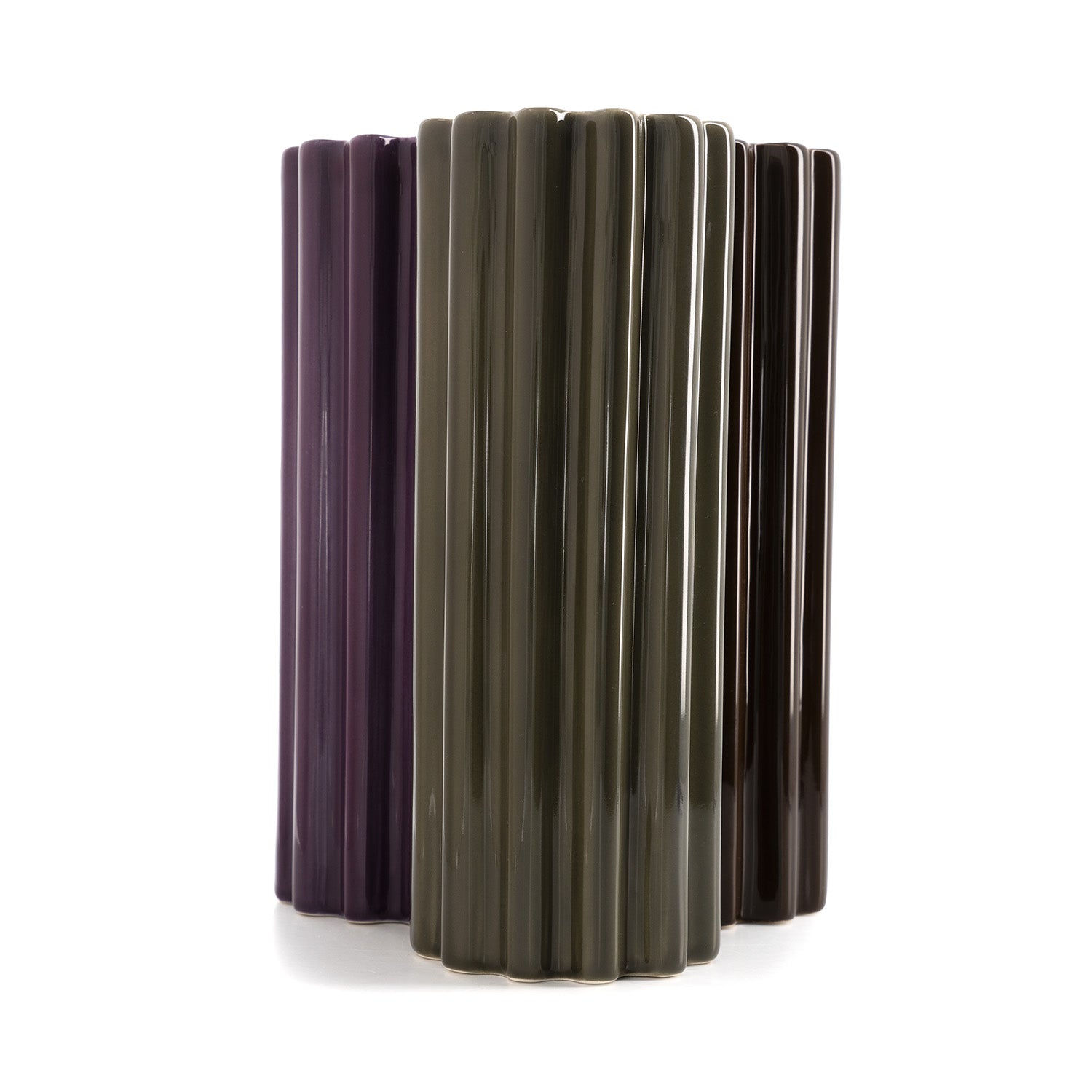 Three high-gloss ceramic vase in purple, green and brown,  with a ribbed design, standing against a white background.
