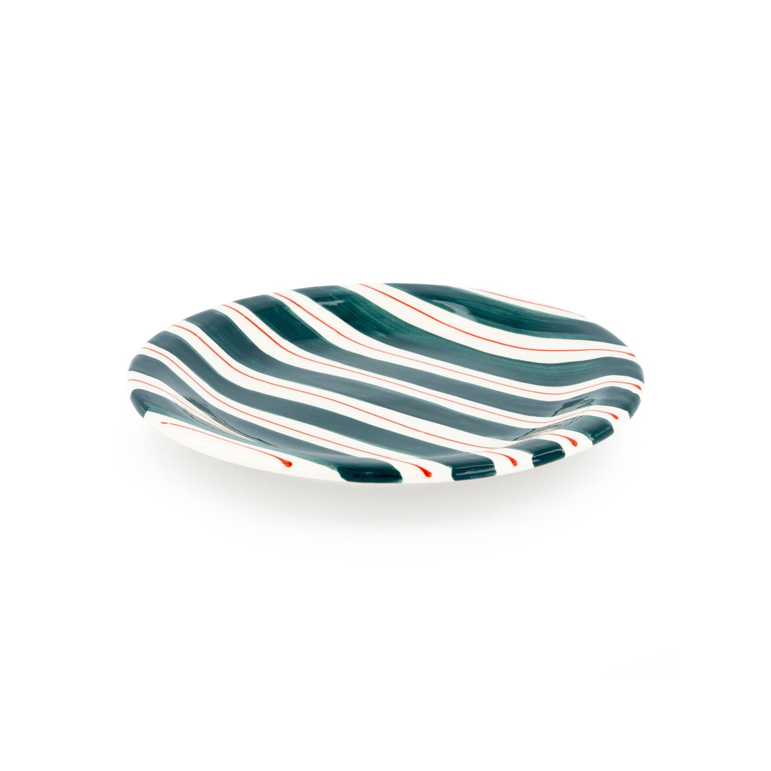 A round ceramic plate with hand-painted green and red stripes on a white background.