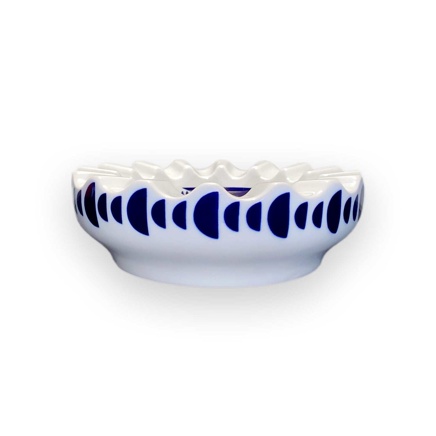 White and navy porcelain valet tray, shown in profile against a white background.