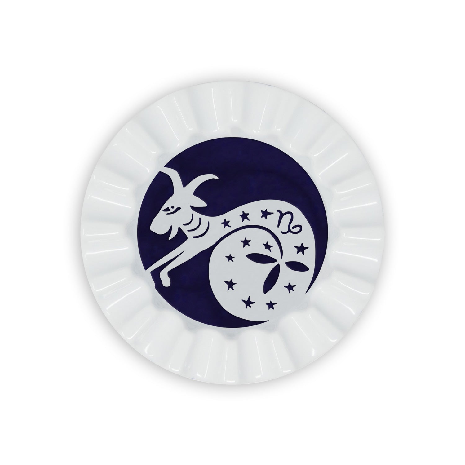 A white porcelain valet trays painted in navy blue a capricorn sign of the zodiac.