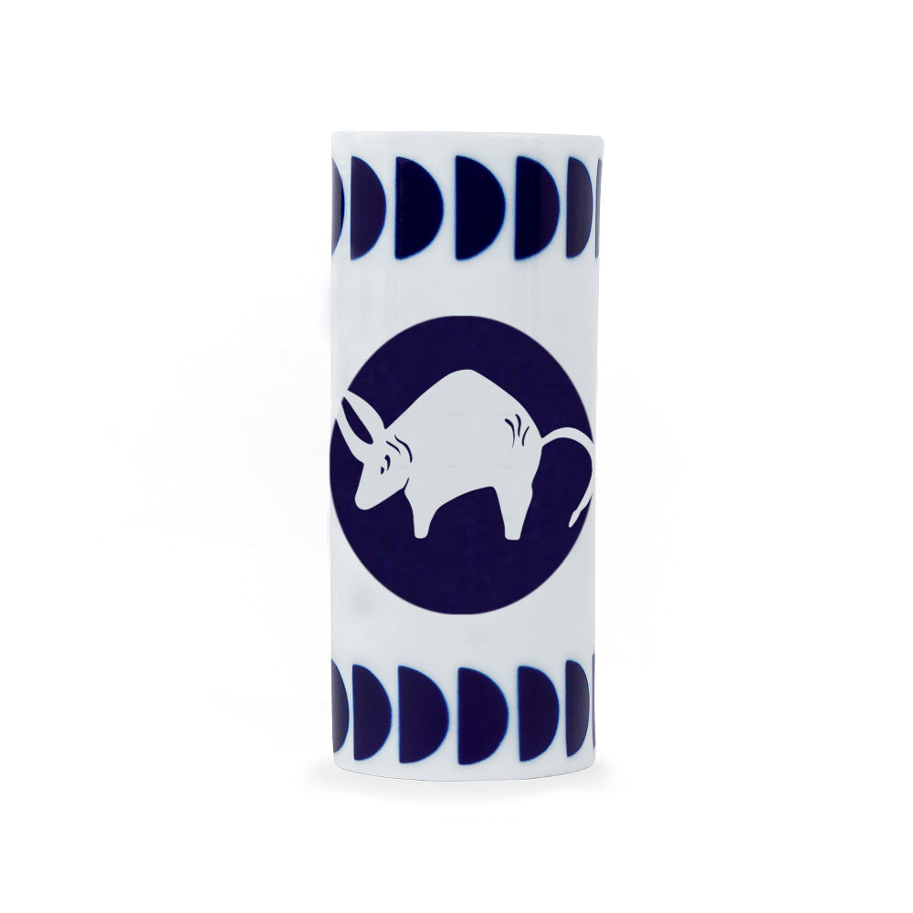 A white porcelain pencil holder with a navy blue zodiac taurus sign design, crafted in Spain.