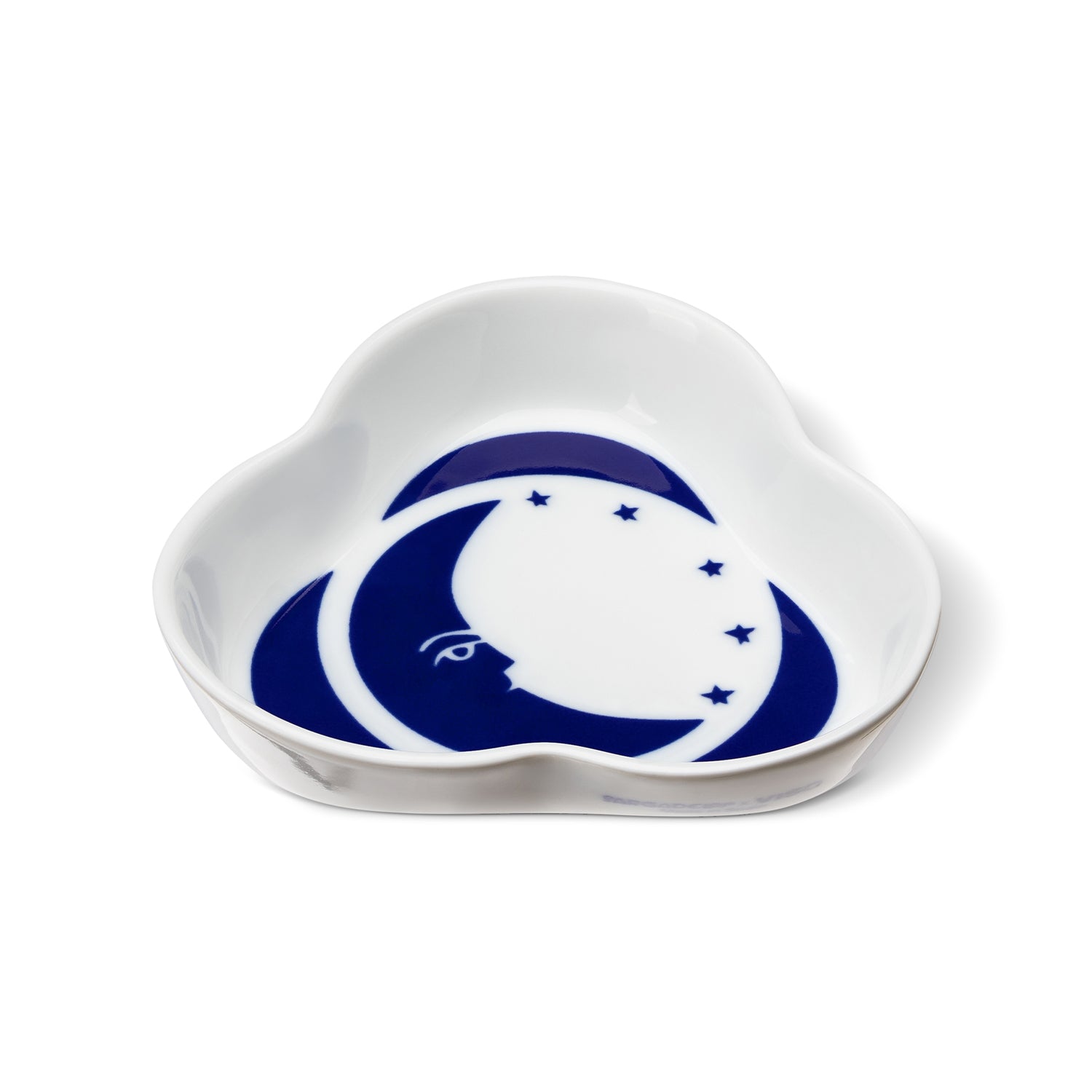 A white porcelain tray with a navy blue moon and stars illustration, crafted in Spain.