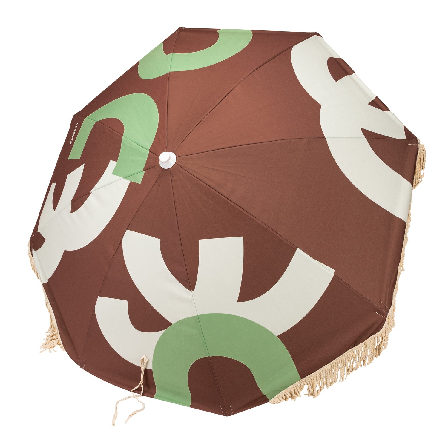 A resort umbrella with a geometric pattern in brown, green, and white colors, view from above
