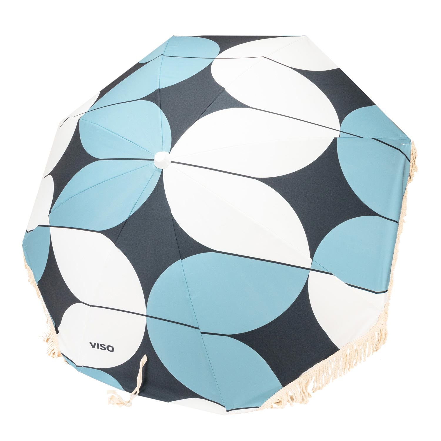 A resort umbrella with a geometric pattern in blue, navy, and white colors, view from side