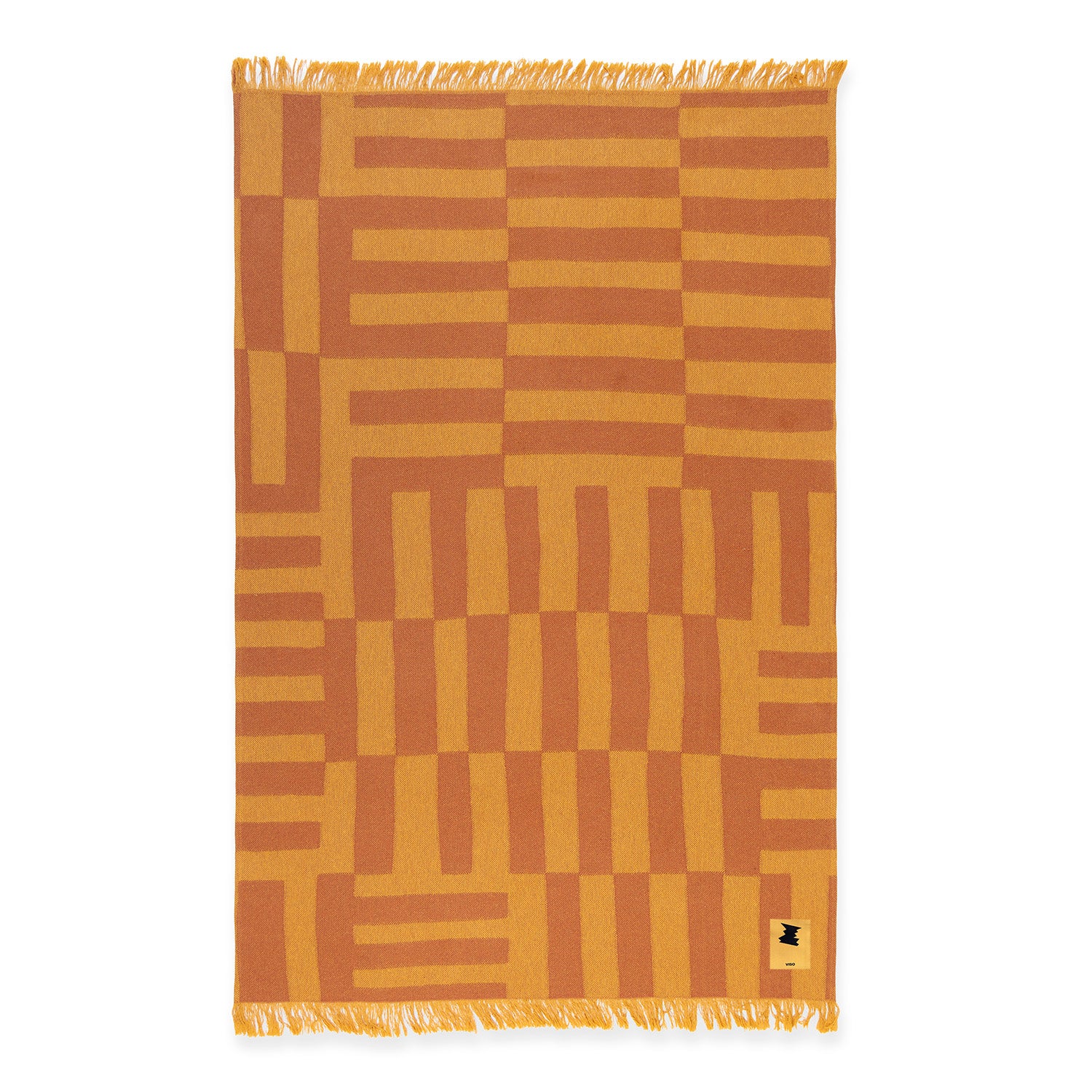 Orange patterned beach towel or picnic blanket on a white background