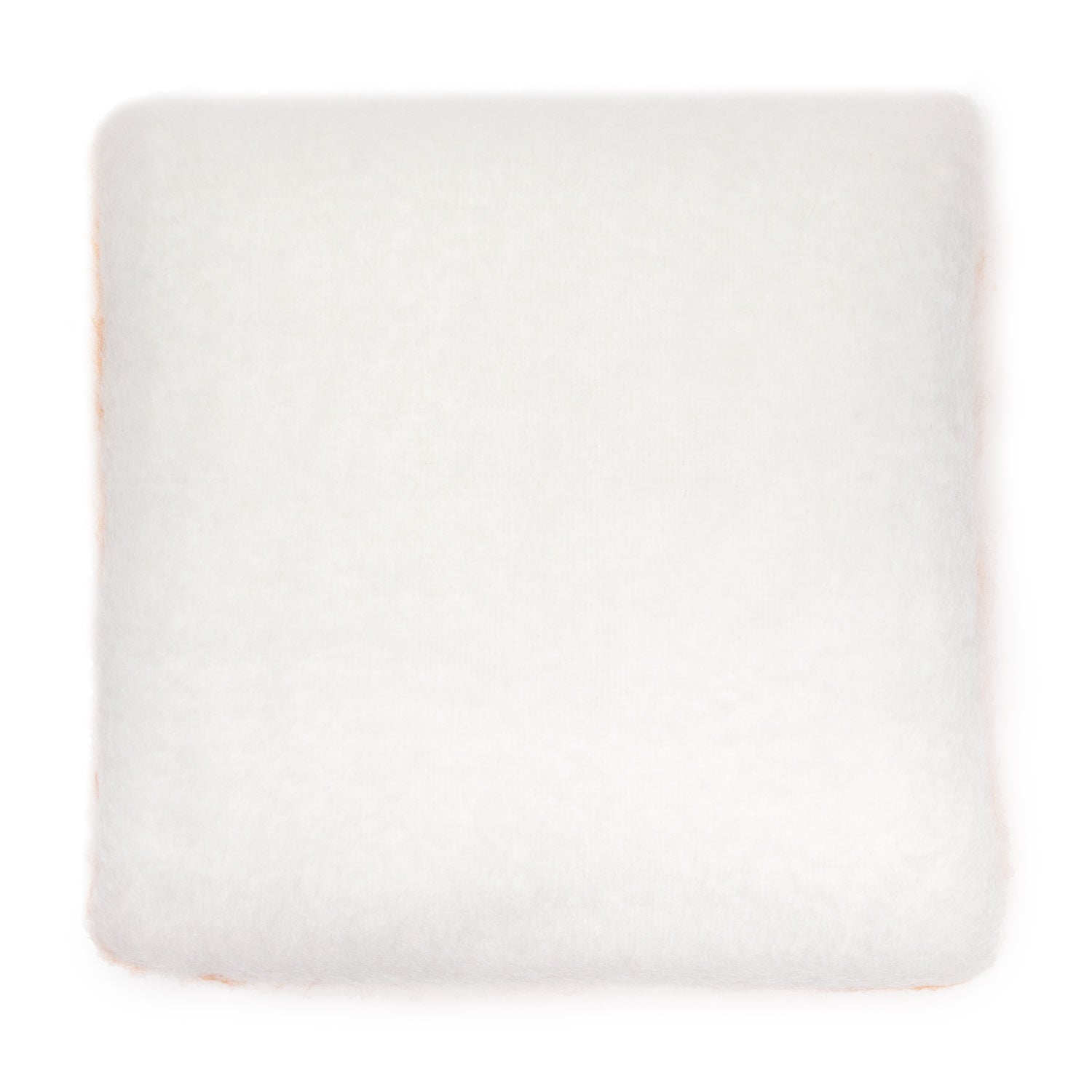 A soft white Mohair pillow with a plush texture, displayed against a white background.