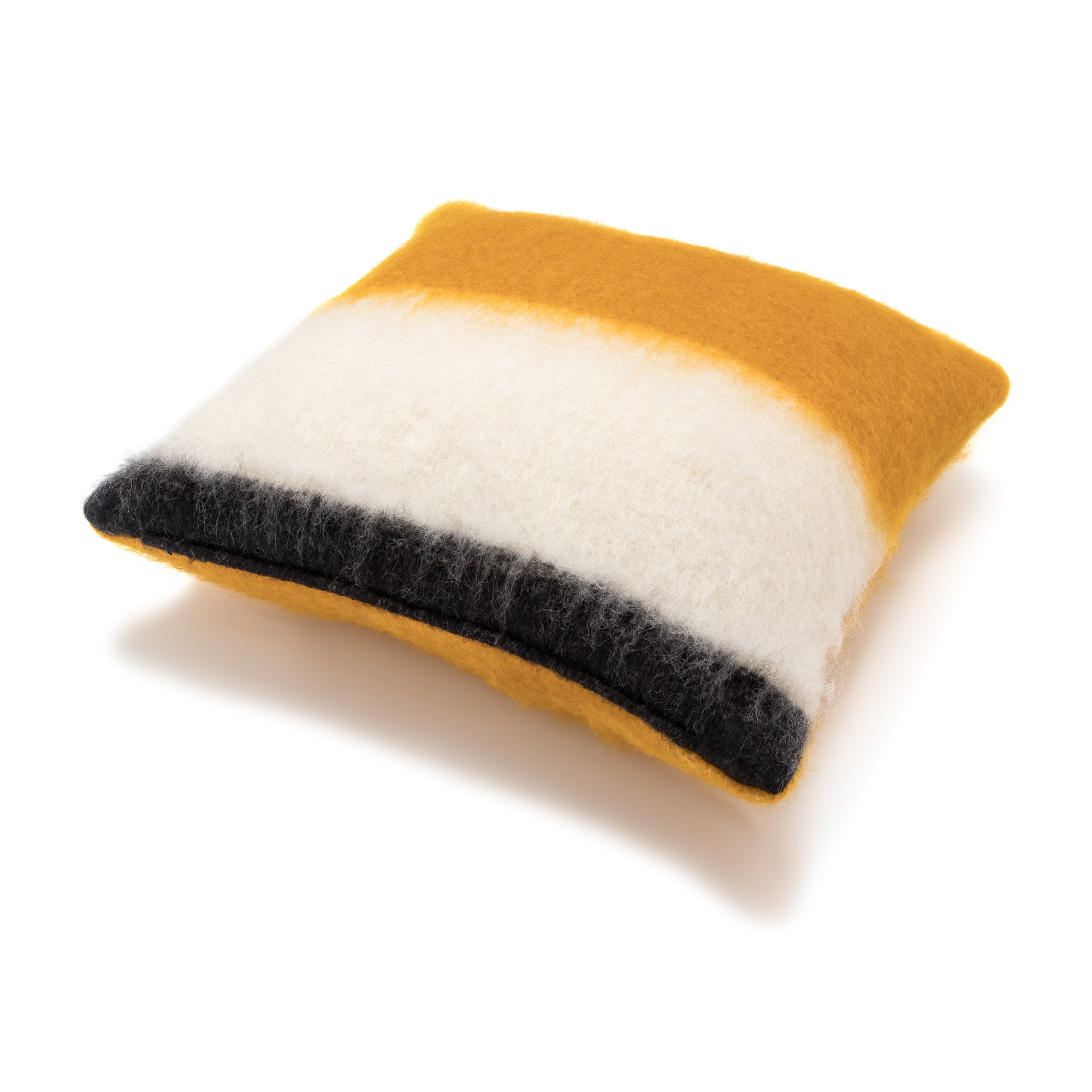 A square-shaped mohair pillow with a color gradient transitioning from mustard yellow at the top, to white in the middle, and black at the bottom.