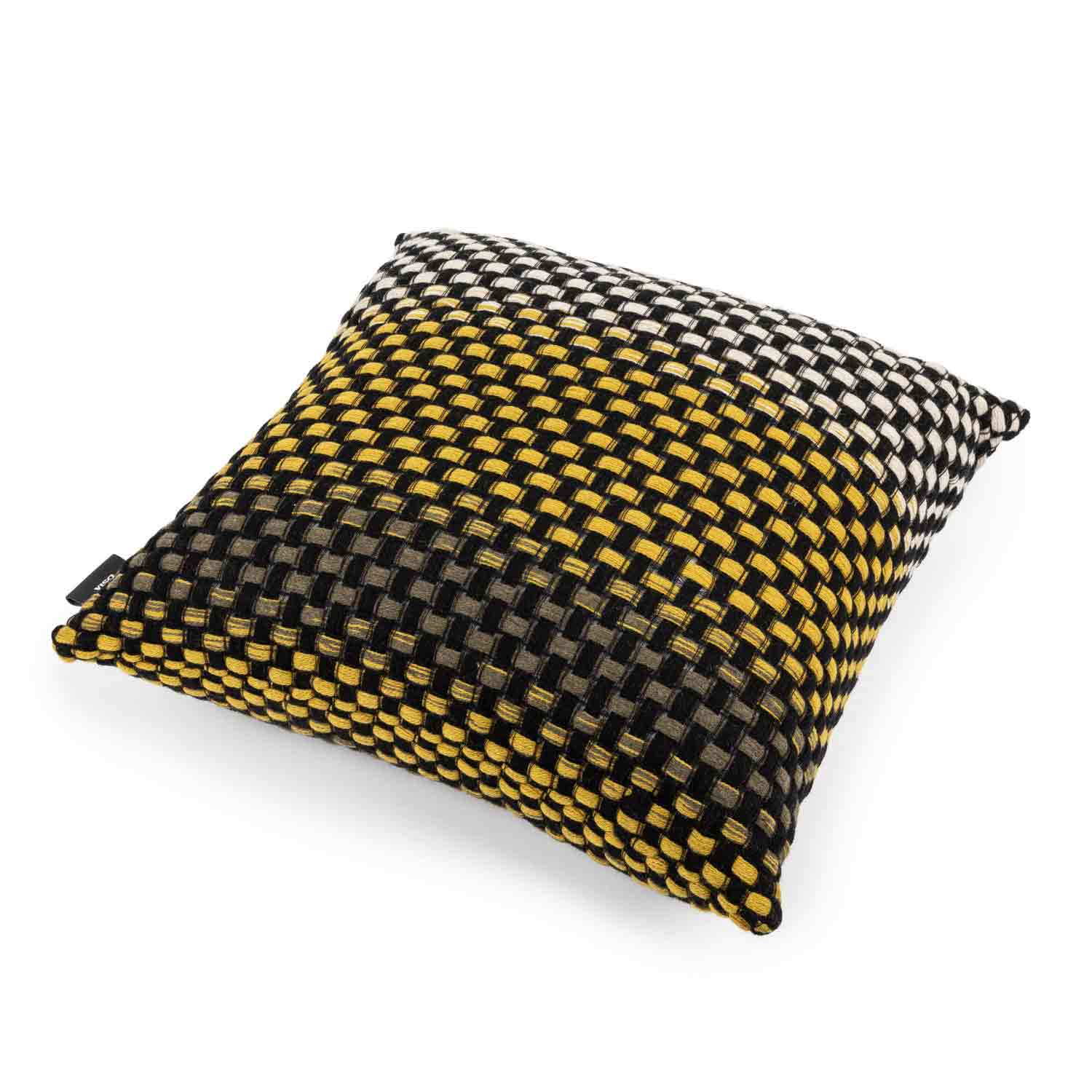 A square-shaped pillow with a geometric basketweave pattern in mustard, gray, and white, and a visible silver label on the bottom corner.