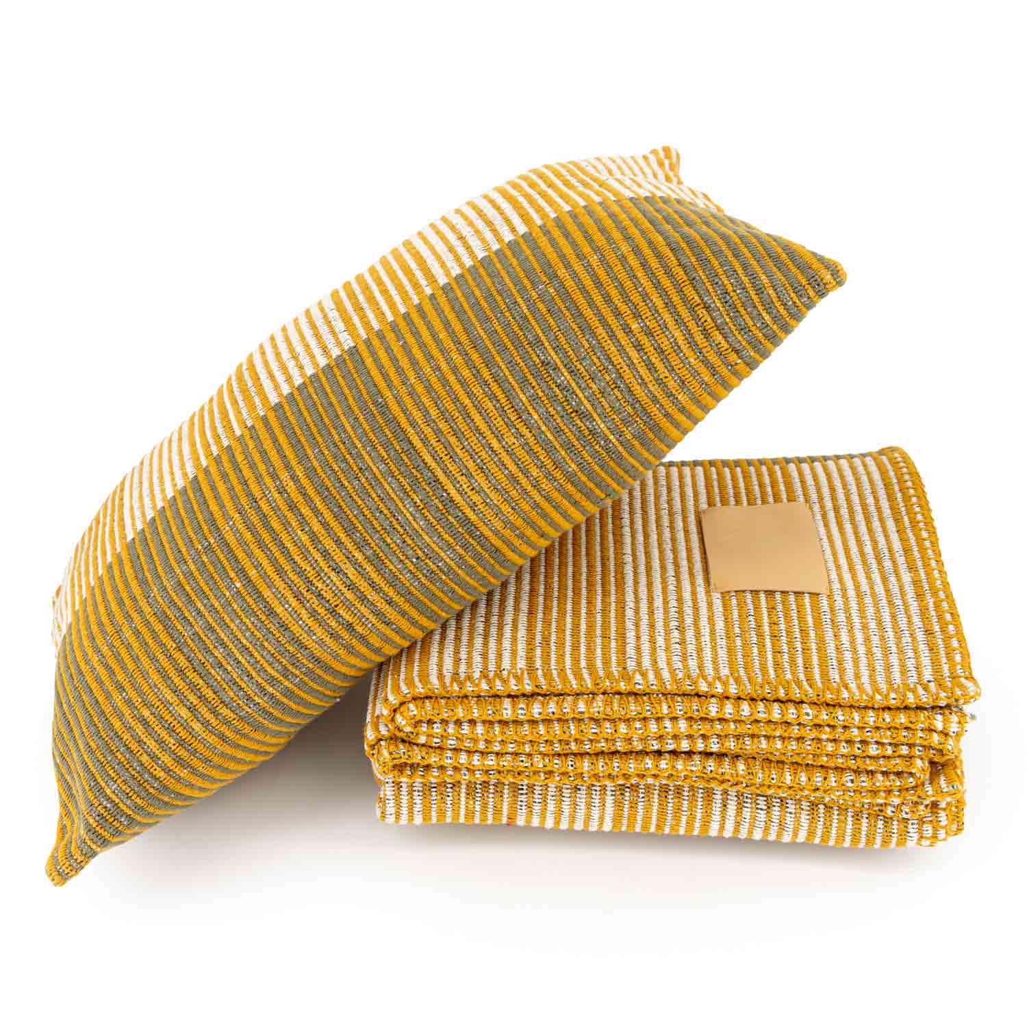 A rectangular cotton weave pillow and blanket with a striped pattern in yellow, green, and white colors.