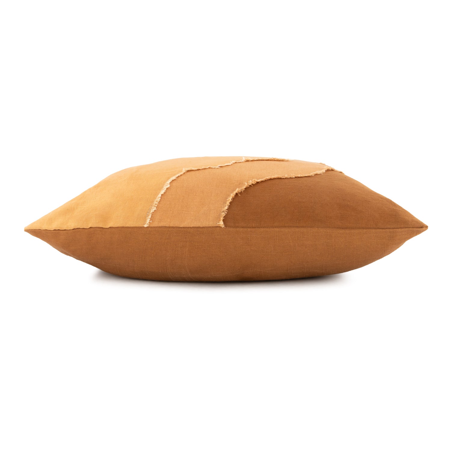 Brown, orange and yellow botanical linen pillow on a white background