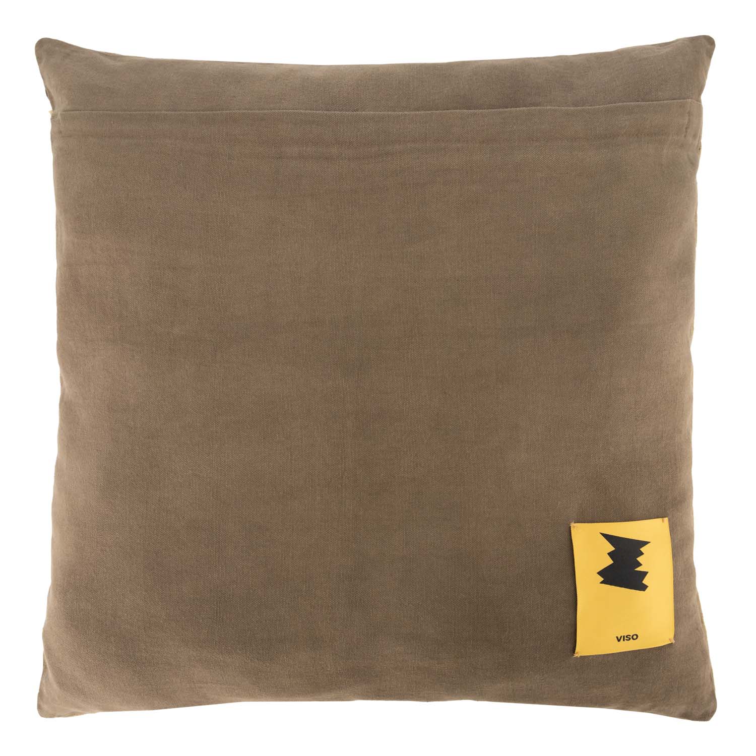 Back of a brown pillow with a yellow label featuring a black logo on a white background