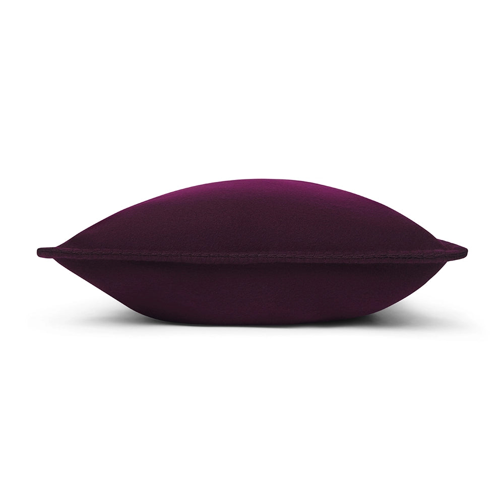 Purple merino pillow on a white background